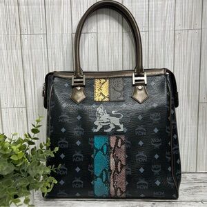 MCM Black Visetos Tote Bag with Multicolor Stripe & Lion Accent Vintage